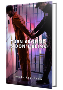 Person in orange jumpsuit restrained by officer behind bars with text about not blinking.